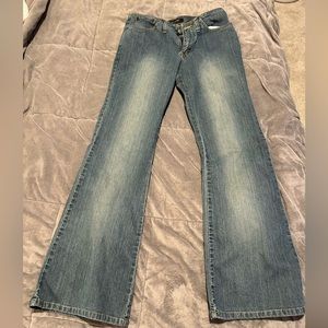 Y2K super low rise flare leg jeans with no back pockets or seams